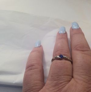 Twisted Ribbon Ring with a Blue Stone